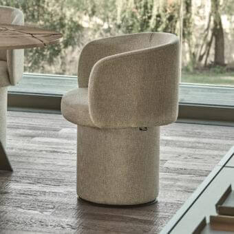 Exclusive Ditre Italia Billie armchair with neutral beige textured textile and sculpted curved silhouette