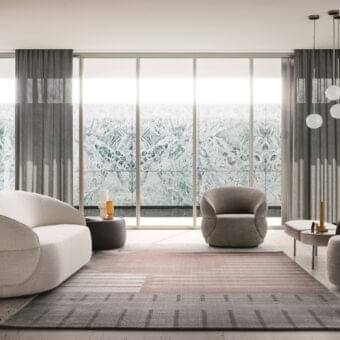 Elegant Ditre Italia Clip sofa with soft lines upholstered in light textured off-white textile with a matte finish