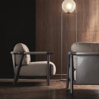 Distinctive Ditre Italia Nathy lounge chair with light beige upholstery and dark gray possibly wooden frame