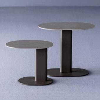 Exceptional Varaschin Plinto side table with oval HPL or bush-hammered ceramic top and dark gray matte finish