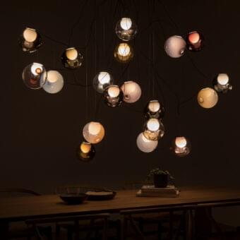 Distinguished Bocci 28 sculptural cable suspension lamp with numerous clear glass spheres and milk white lamp holders within black cables