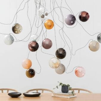 Distinguished Bocci 28 sculptural lamp with hand-blown glass spheres in amber, brown, gray, white, pink, and clear tones with milk white interiors