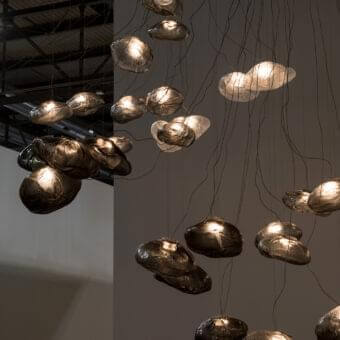 Captivating Bocci 73 sculptural lamp with amorphous clear glass pendants and brushed nickel canopy