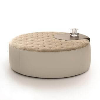 Distinguished Ditre Italia Clip ottoman with tufted textile cushion and matte light beige leather base, complemented by a dark metal side table