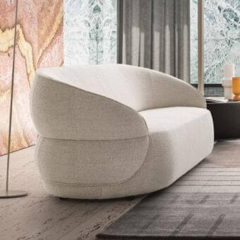 Distinguished Ditre Italia Clip sofa with enveloping comfort in light neutral textile and textured finish