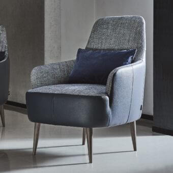 Sophisticated Ditre Italia Ray lounge chair with dark leather and woven gray blue textile upholstery, built with elegant wooden legs