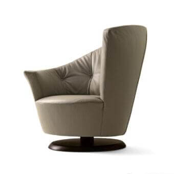 Exceptional Giorgetti Arabella lounge chair in light beige refined fabric or leather with elegant button tufting and bronze metal swivel base