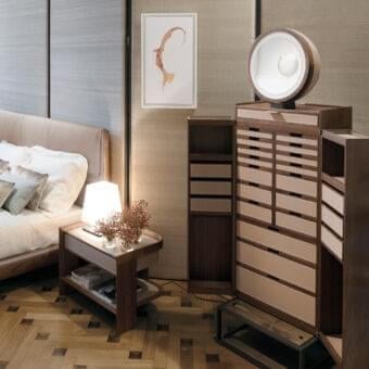 Distinguished Giorgetti Archibald nightstand crafted in solid Canaletto walnut with light beige saddle leather and matte finish