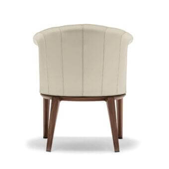Superior Giorgetti Aura armchair with curved saddle leather and solid canaletto walnut base showcasing skilled Italian craftsmanship