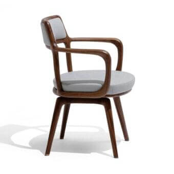 Distinguished Giorgetti Baron armchair with curved lines and light gray upholstery in canaletto walnut profiles