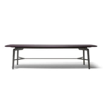 Distinguished Giorgetti Blade table in wood with polished striped finish and sleek gray legs with metal support