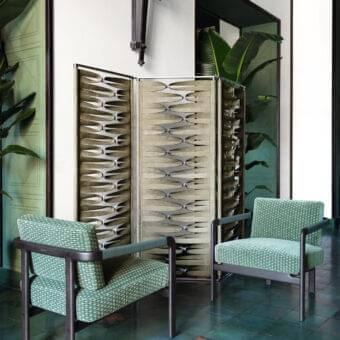 Distinguished Giorgetti Borealis room divider with rotating aluminum panels and a beige leather band secured with eyelets