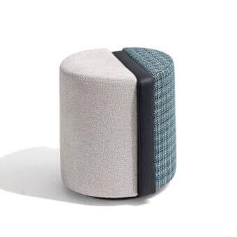 Exclusive Giorgetti Summa ottoman presenting cylinder form with textured textile and blue-white patterned weave with central leather element