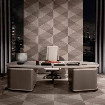 Distinguished Giorgetti Tycoon desk with light gray tabletop and darker gray textured pedestals crafted in maple with saddle leather inserts and matte finish