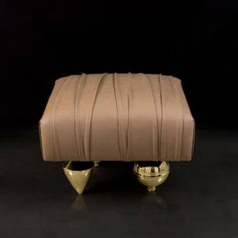Lavish Il Pezzo Mancante Il Pezzo 1 ottoman in light tan leather showcasing gathered detailing with refined sand brass casting feet