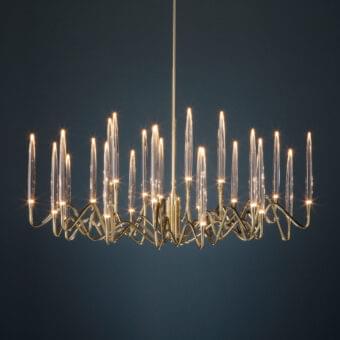 Luxury Il Pezzo Mancante Il Pezzo 3 chandelier crafted in hand-forged brass with clear solid crystal and a warm satin finish