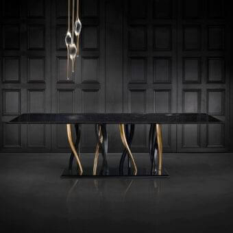 Distinguished Il Pezzo Mancante Il Pezzo 8 table with black Marquinia marble tabletop and intricately intertwined black and gold finished legs