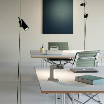 Distinguished Lodes Cima floor lamp with a sleek black metal structure and vibrant green and black rope accents