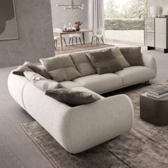 Elegant Presotto Bali sectional with light beige fabric, contrasting cushions and refined Peltro painted legs