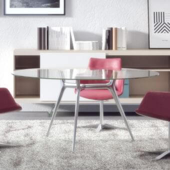Elegant Presotto P016 table with transparent glass top and silver metal built with three aluminum legs