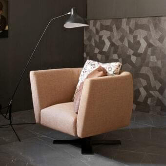 Sophisticated Presotto Saint Barth lounge chair with light brown textured fabric upholstery and refined Peltro metal base
