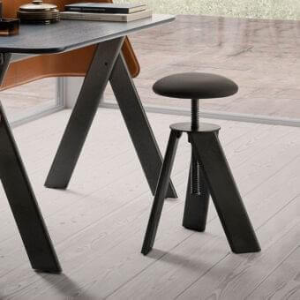 Distinguished Presotto Squid stool with fabric upholstery and sleek black metal base exhibiting a matte finish
