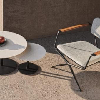 Elegant Royal Botania Butler side table with layered effect and matte black coated stainless steel base