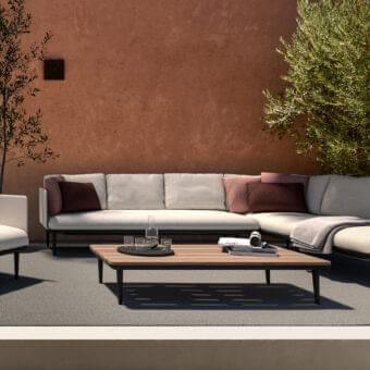 Exclusive Royal Botania Styletto lounge chair with light gray cushioned seat and dark coated aluminum frame