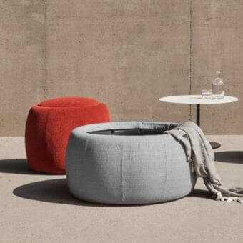 Innovative Royal Botania Tono ottoman with light gray textile and hollow moulded plastic core presents a textured matte surface