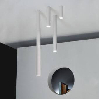 Superior Lodes A-Tube ceiling lamp crafted in matte white with a metal structure and vertically suspended cylindrical tubes