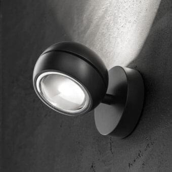 Elegant Lodes Nautilus Mini wall lamp crafted in metal with a matte dark gray finish illuminating with balanced directional light