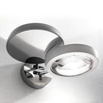 Elegant Lodes Nautilus wall lamp crafted in polished metal with a bright silver tone finish and adjustable form