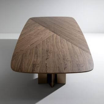 Superior Bonaldo Geometric 400 table with a Canaletto Walnut veneered top and star shaped painted aluminum bases