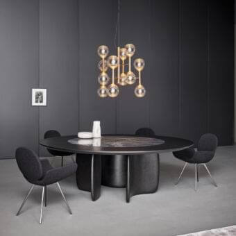 Innovative Bonaldo Mellow St table with Canaletto Walnut veneered wood and ceramic rotating section in brushed bronze high-density polyurethane finish