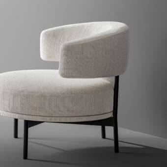 Distinguished Bonaldo Neuilly lounge chair with light beige woven fabric upholstery and a slender dark metal frame