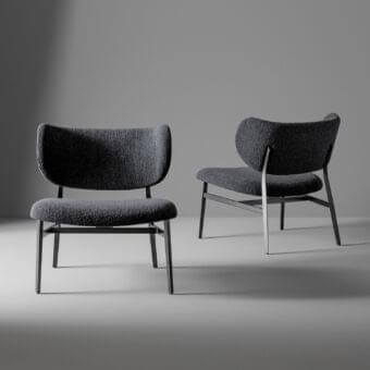 Sophisticated Bonaldo Noor lounge chair with subtly curved backrest upholstered in textured dark gray textile and matte metal base