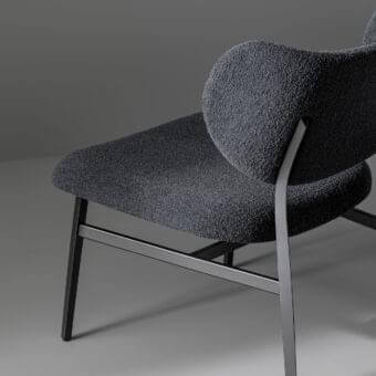 Distinguished Bonaldo Noor lounge chair with dark gray textured textile upholstery and matte finished metal frame