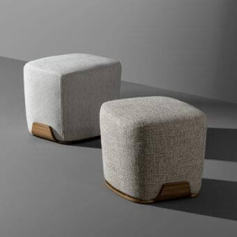 Exceptional Bonaldo Olos ottoman with rounded padding and curved Canaletto Walnut base upholstered in textured dark gray fireproof fabric with matte finish
