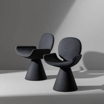 Distinguished Bonaldo Youpi armchair upholstered in matte dark gray textile with a conical base and embracing silhouette