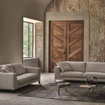 Distinguished Ditre Italia Artis sofa with elegant lines upholstered in matte light grey textile and subtle metal legs