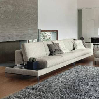Meticulous Ditre Italia Artis sofa with textured light beige fabric and slender dark metal legs built with Punto Pettine stitching
