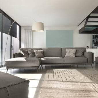 Elegant Ditre Italia Kris sectional with smooth matte gray textile upholstery and stylish metal feet