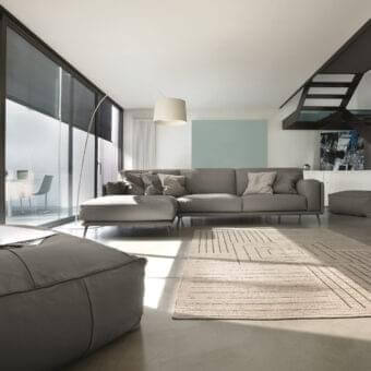 Distinguished Ditre Italia Kris sectional with smooth matte gray textile and elegant metal feet construction