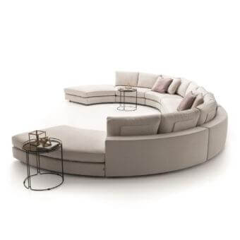 Sophisticated Ditre Italia Loman sectional with removable light beige fabric, contrasting cushions and lacquered metal side table