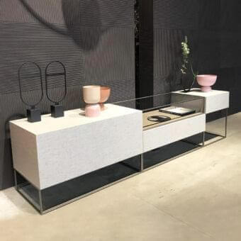 Distinguished Ditre Italia Unit sideboard with geometric silhouette, off-white textile and sleek metal base, plus glass display area