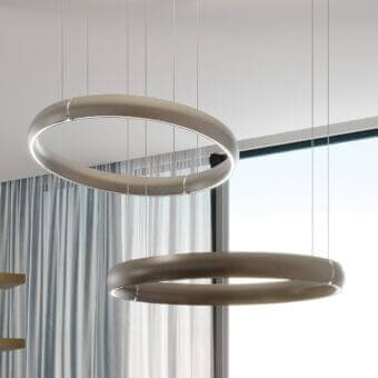Superior Reflex Cerchio suspension lamp with a broad ring-shaped shade in muted light bronze or grey wood finish