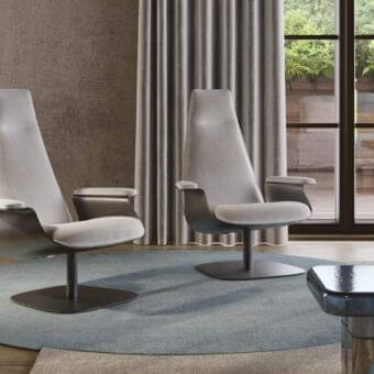 Distinguished Reflex Minerva lounge chair with light gray textile upholstery and dark-finished metal base offering a matte finish