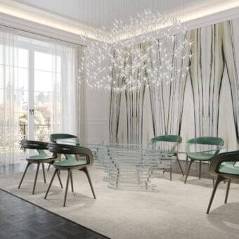Elegant Reflex Nido armchair with smooth green upholstery and matte-finish wooden frame and legs