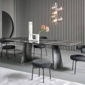 Superior Bonaldo Torii table with glossy marble top and inclined metal base creating a visually balanced silhouette