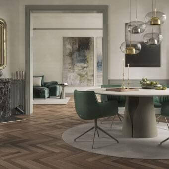Exclusive Cattelan Italia Giano table with round spatulate clay top and curved pedestal base in a light beige finish